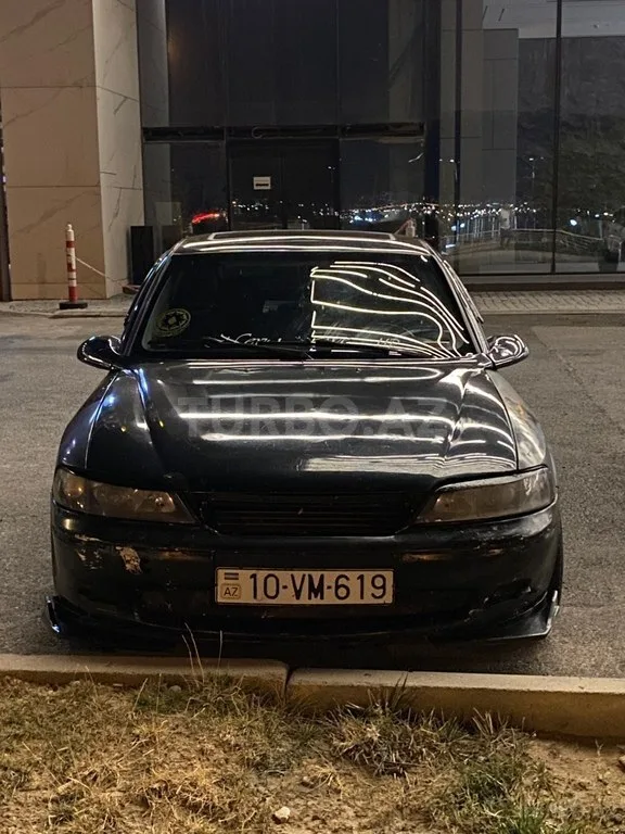 Opel Vectra — фото 1/4