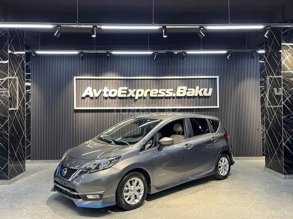 Nissan Note — фото 1/4